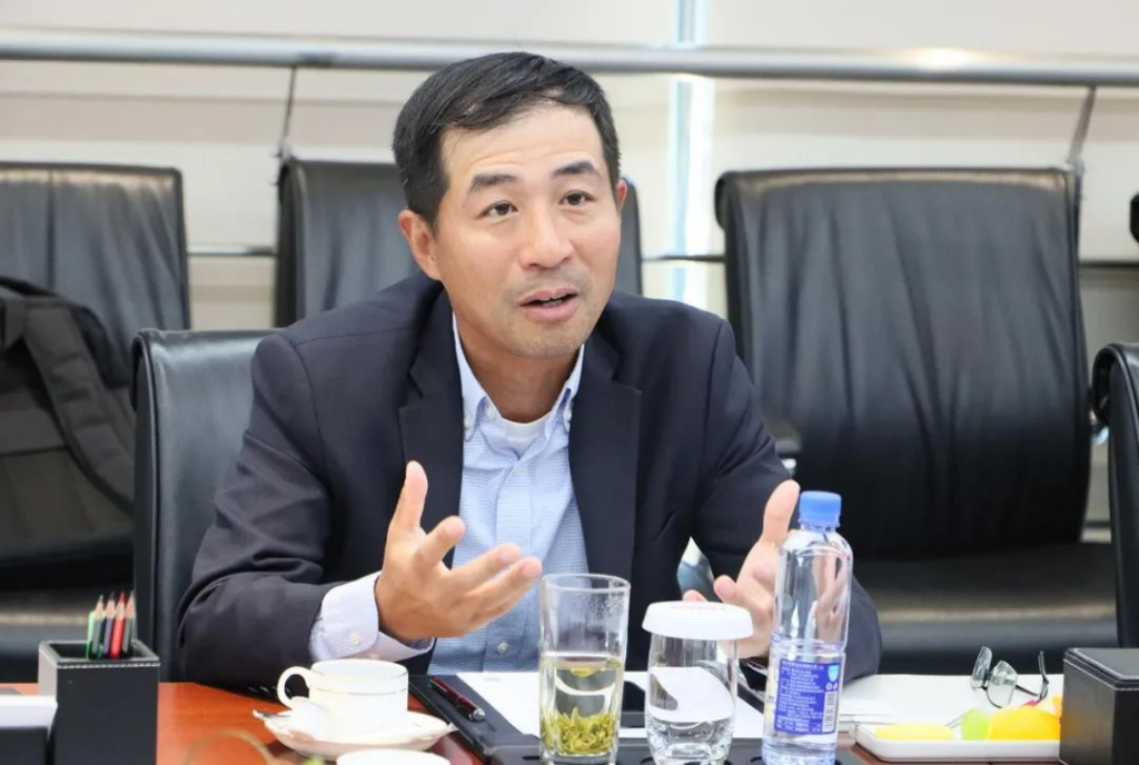 隆基绿能总裁李振国会见陈高志 黄翱清一行