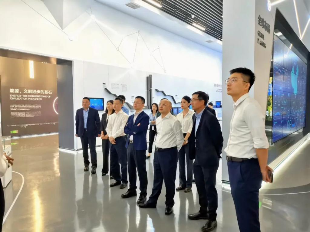 隆基绿能总裁李振国会见陈高志 黄翱清一行